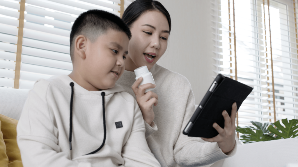 woman-and-son-talking-to-doctor-through-iPad